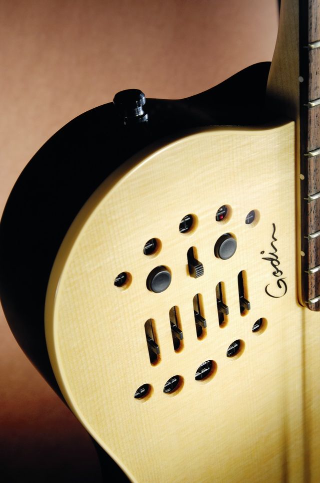 Godin A4 SA sem-acoustic bass The A4 SA's controls are cleverly disguised as a slotted soundhole.